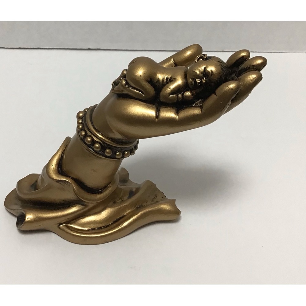 Mother’s hand with a baby, 4’ inches tall in excellent condition.